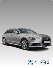 Silver car that holds 4 passengers and 2 suitcases