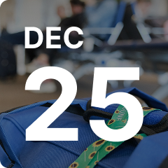 Close-up of a blue travel bag with a green luggage tag in an airport, featuring the text "DEC 25" overlaid.