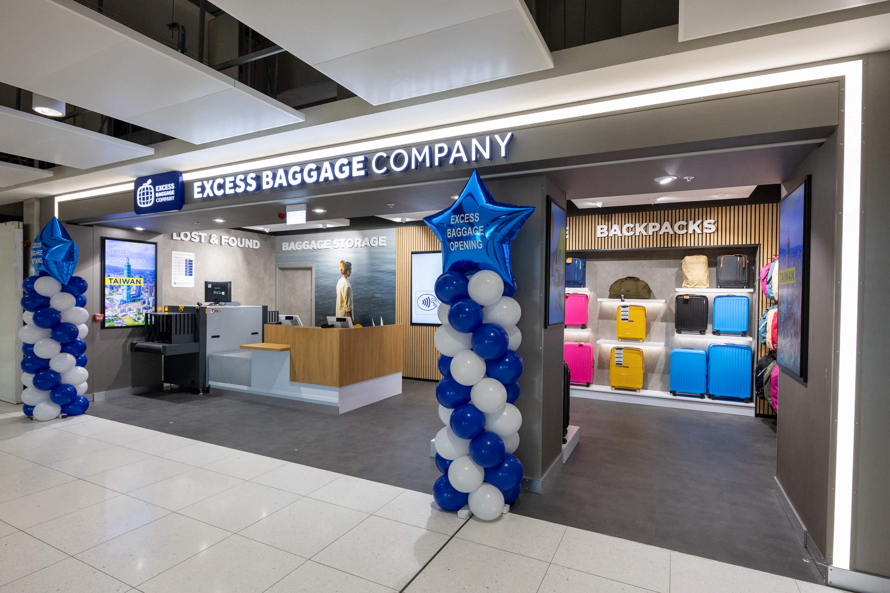 Excess Baggage Company store with a Lost & Found, baggage storage, colourful backpacks.