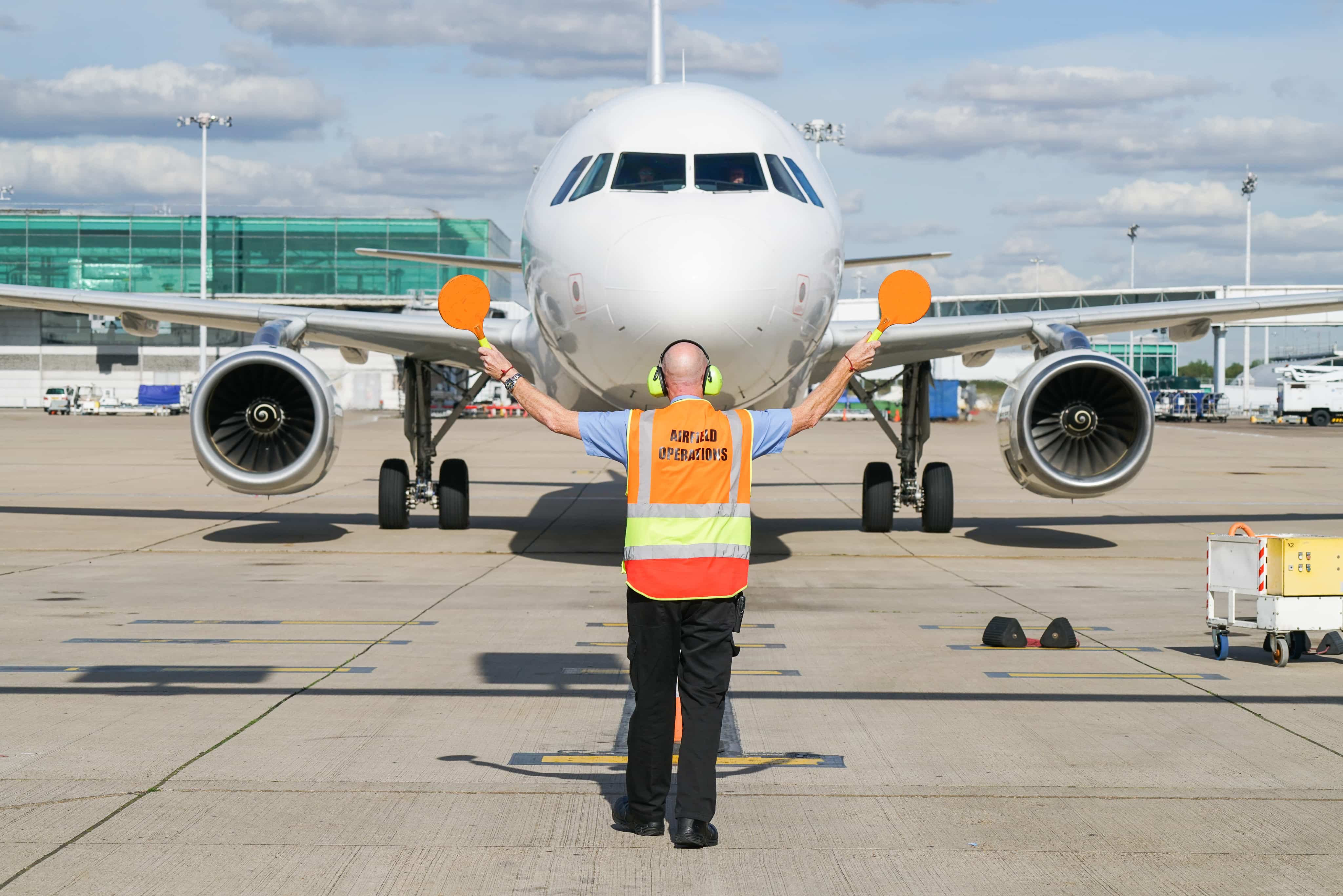 Man getting plane ready for take off