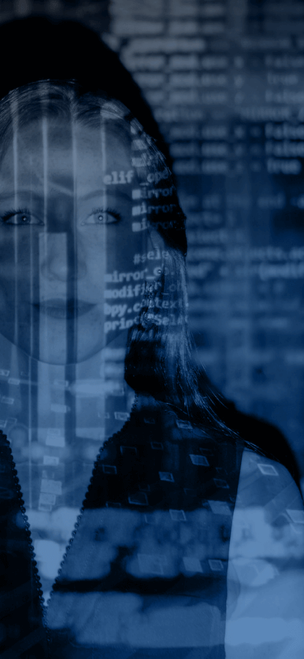 a woman standing against a dark wall with numbers and computer code projected onto her. The image is washed with a dark blue colour