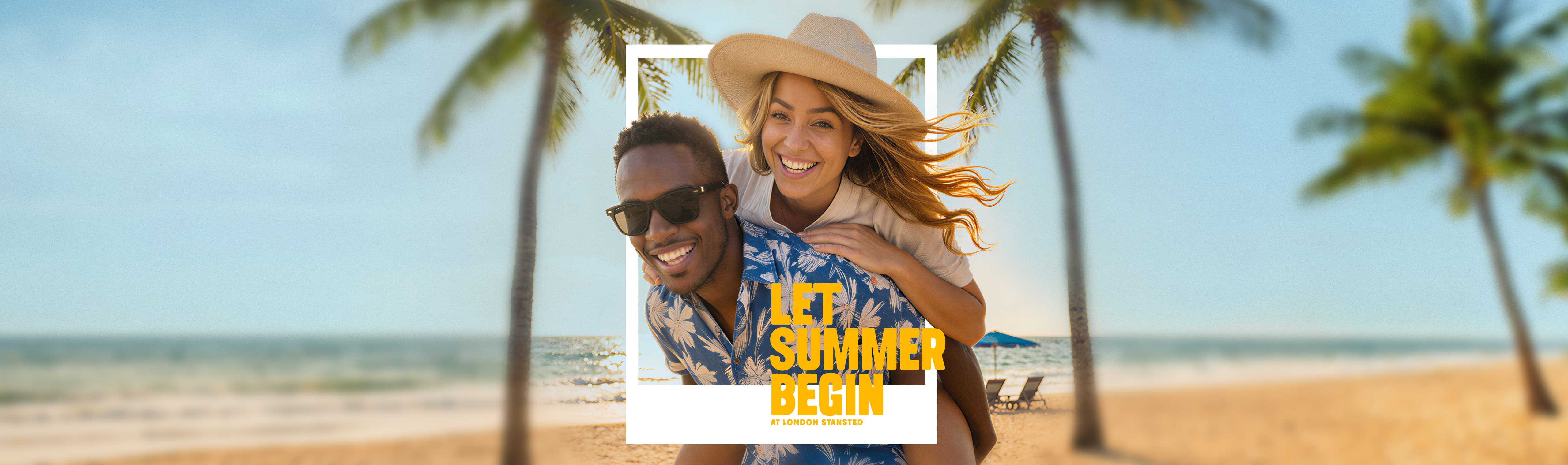 Smiling couple enjoying a piggyback ride on a sunny beach under palm trees with the text "Let Summer Begin" overlaying the image.